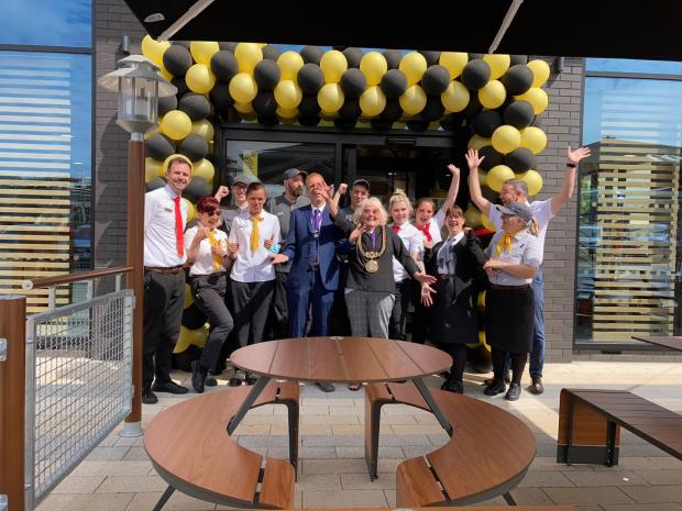 Dorset Echo: Cllr Ann Weaving opens the new McDonald's